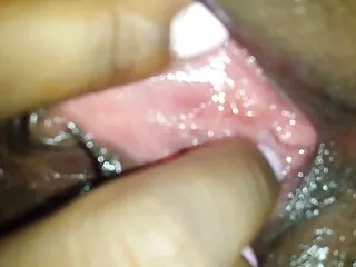 Hot indian babe playing with wet pink pussy close up