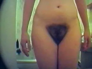 Hairy pussy girl caught on hidden cam