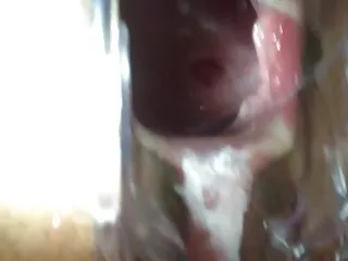 Look inside her pussy trough speculum
