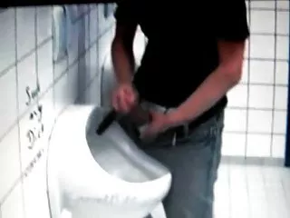 Azeri jerking huge cock at public toilet